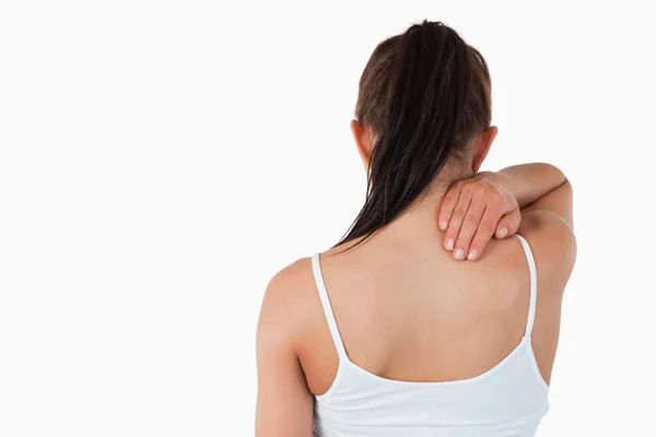 Widok kobiety z ból szyi z tyłu — Zdjęcie stockowe