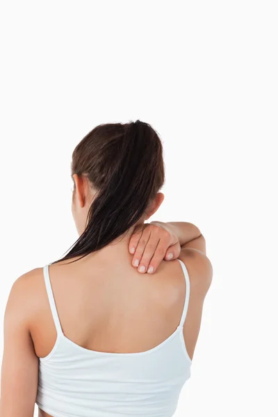 Visão traseira da fêmea com dor no pescoço — Fotografia de Stock