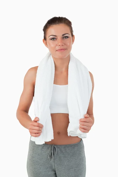 Young woman with towel around her neck — Stock Photo, Image