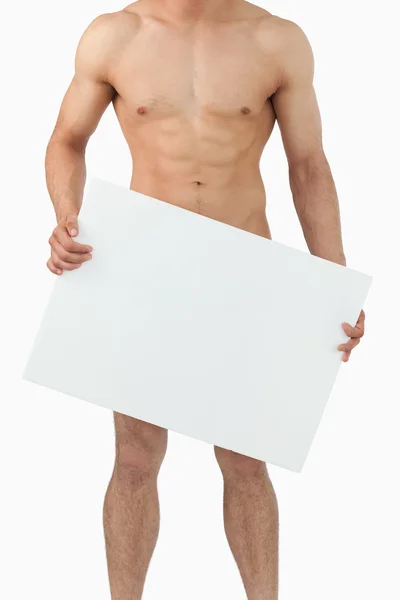 Atletic corpo masculino segurando banner — Fotografia de Stock