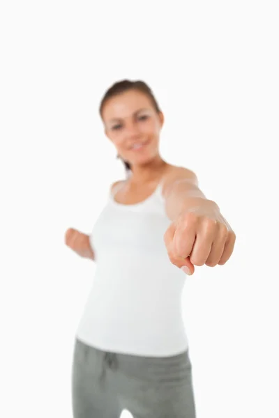 Left fist of female martial arts fighter striking — Stock Photo, Image