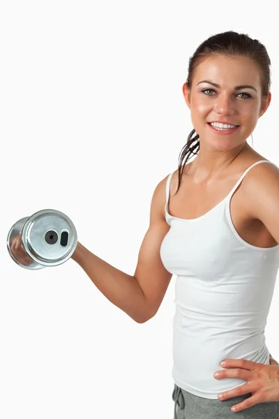 Retrato de una mujer sonriente haciendo ejercicio — Foto de Stock
