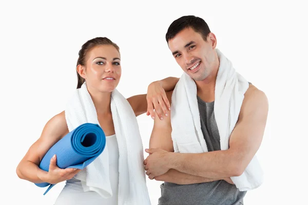 Fit couple going to practice yoga — Stock Photo, Image