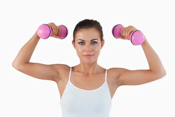 Fit woman working out with dumbbells — Stock Photo, Image