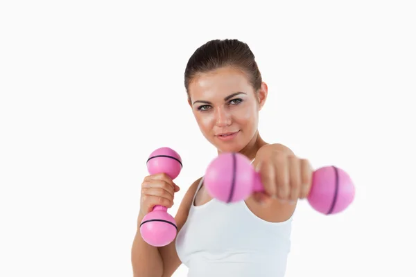 Young woman working out with dumbbells — Stock Photo, Image