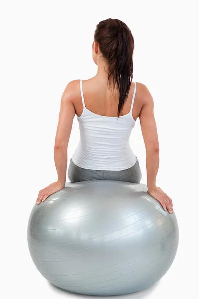 Portrait of a woman working out with a ball — Stock Photo, Image