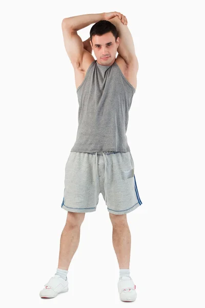 Retrato de um homem esticando o braço — Fotografia de Stock