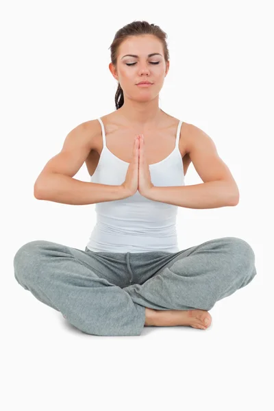 Portrait of a young woman in the Sukhasana position — Stock Photo, Image