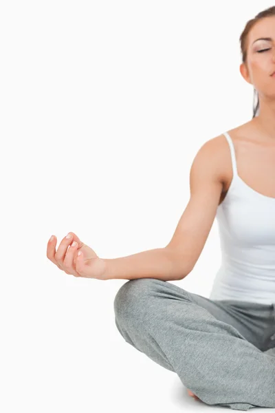 Portrait of a meditating woman in the Sukhasana position — Stock Photo, Image