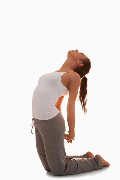 Portrait of a woman in the Ustrasana position — Stock Photo, Image