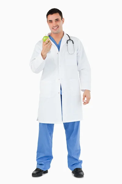 Retrato de un médico con una manzana —  Fotos de Stock