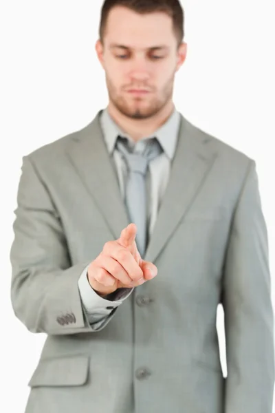 Businessman using futuristic touchscreen — Stock Photo, Image