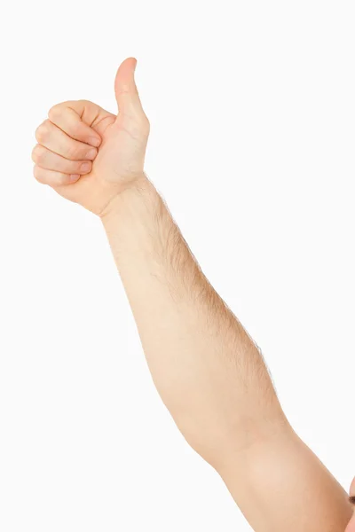 男性の腕を親指をあきらめることの側面図 — ストック写真