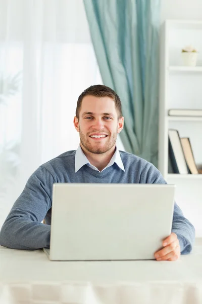 Smiling male in his homeoffice — Stock Photo, Image