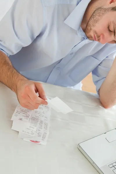 Businessman concerned about invoices — Stock Photo, Image