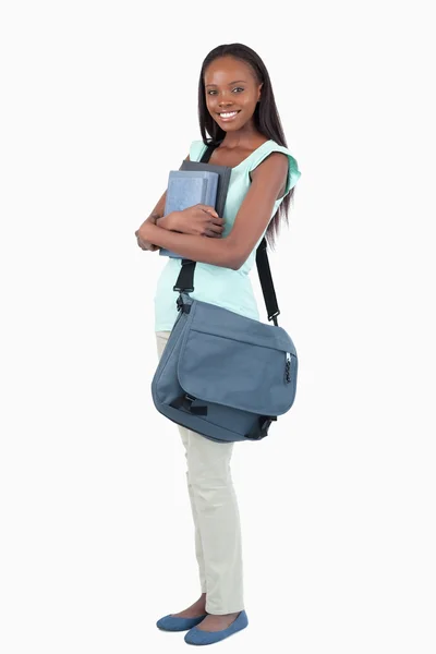 Side view of young female student ready for class — Stock Photo, Image