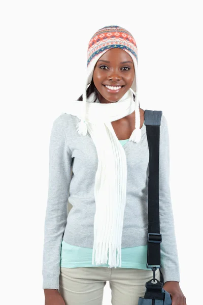 Smiling female student in winter clothing — Stok fotoğraf
