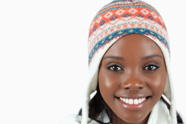 Close up of smiling woman with hat on — Stock Photo, Image