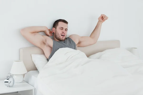 Man stretching his arms — Stock Photo, Image