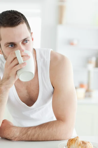Portrait of a young man having coffee — Stock Photo, Image