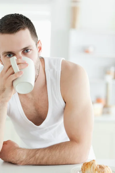 Portrait of a young man having tea — Stock Photo, Image