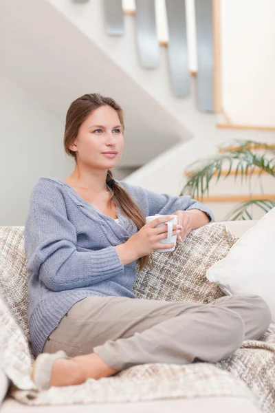 Portrait of a calm woman holding a cup of tea — Stock Photo, Image