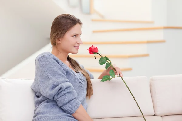 Woman posing with a rose — Stock Photo, Image