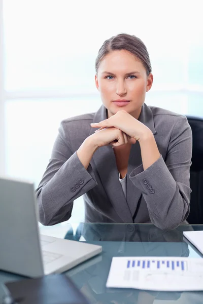 Portrait of a solemn businesswoman working — Stock Photo, Image