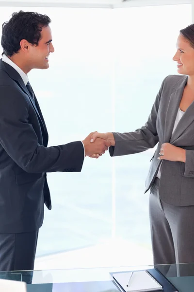 Side view of business welcoming each other — Stock Photo, Image