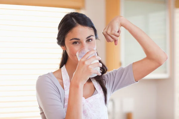 Healthy woman drinking milk — Stock Photo, Image