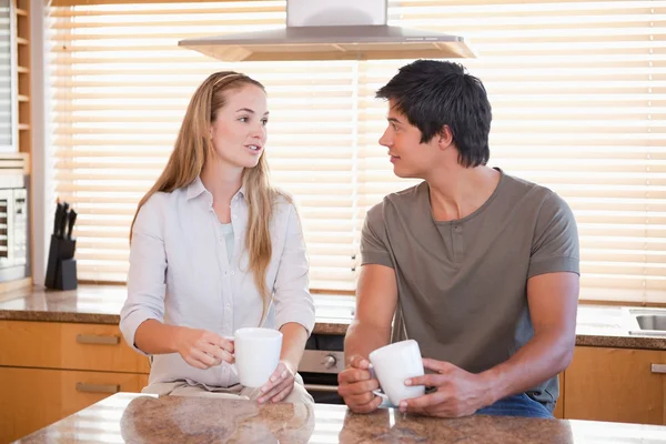 Couple having a cup of coffee — Stock Photo, Image