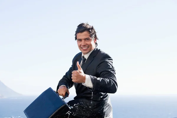 Cheerful businessman with the thumb up — Stock Photo, Image