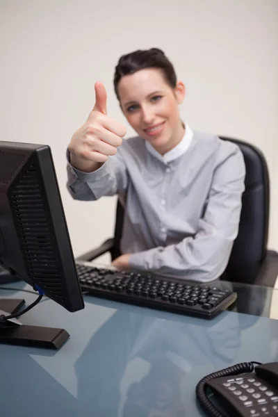 Thumb up given by businesswoman — Stock Photo, Image