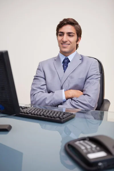 Businessman leaning back satisfied — Stock Photo, Image