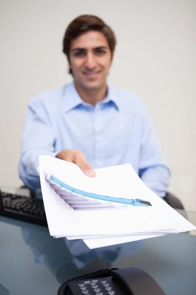 Statistics being handed over by businessman — Stock Photo, Image