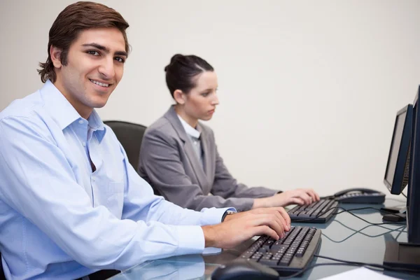 Side view of business team on their computers — Stock Photo, Image