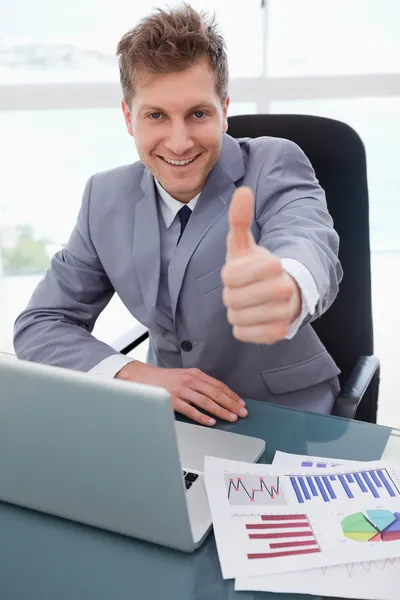Happy businessman giving thumb up — Stock Photo, Image