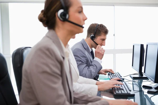Side view of call center agents — Stock Photo, Image