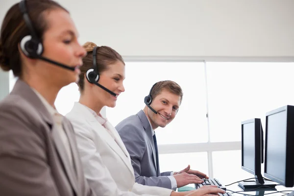 Side view of call center team — Stock Photo, Image