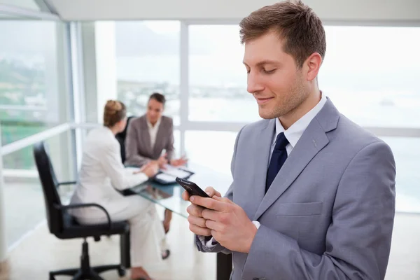 Sales manager writing text message — Stock Photo, Image