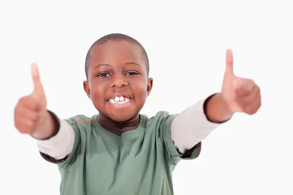 Мальчик с большими пальцами вверх — стоковое фото
