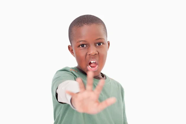 Jongen zeggen stop met zijn hand — Stockfoto