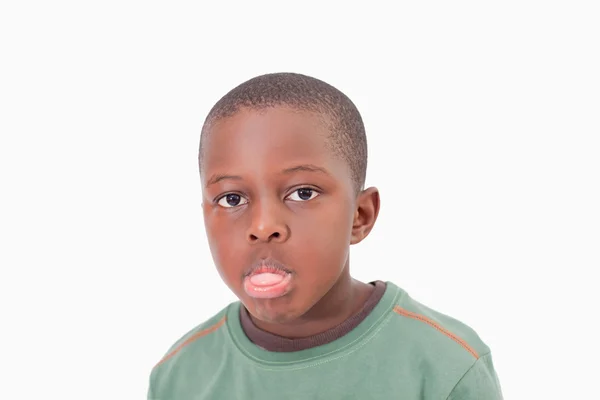 A fiú kidugja a nyelvét — Stock Fotó