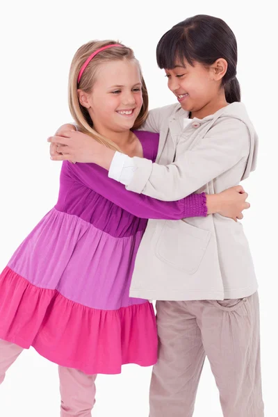 Portrait of girls hugging — Stock Photo, Image