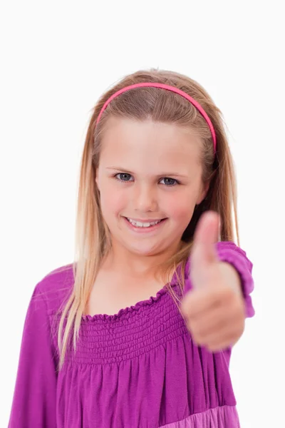 Portrait of a girl with the thumb up — Stock Photo, Image
