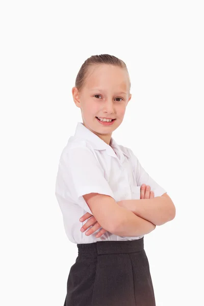 Portrait of a serious girl with the arms crossed — Stock Photo, Image