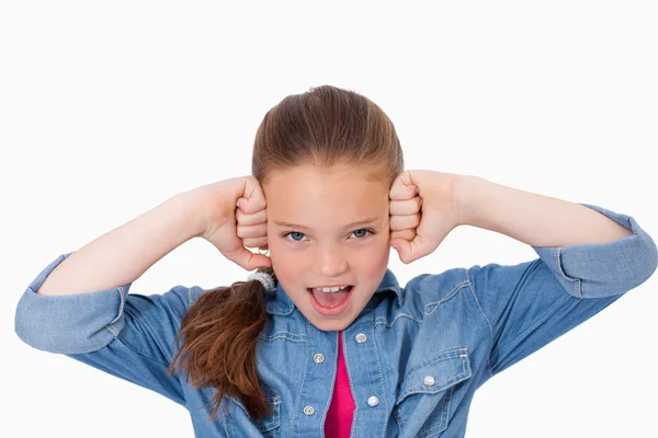 Girl with the fists on her face — Stock Photo, Image