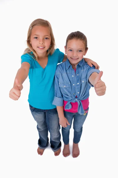 Portrait of girls with the thumbs up — Stock Photo, Image