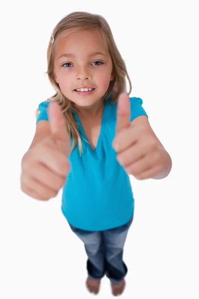 Porträtt av en ung flicka med tummen upp — Stockfoto