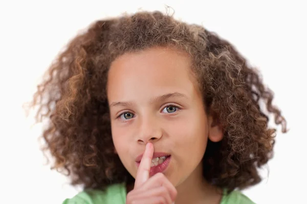 Close up of a girl asking for silence — Stock Photo, Image
